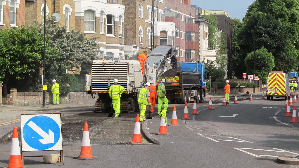 Road works with dumper and crusher